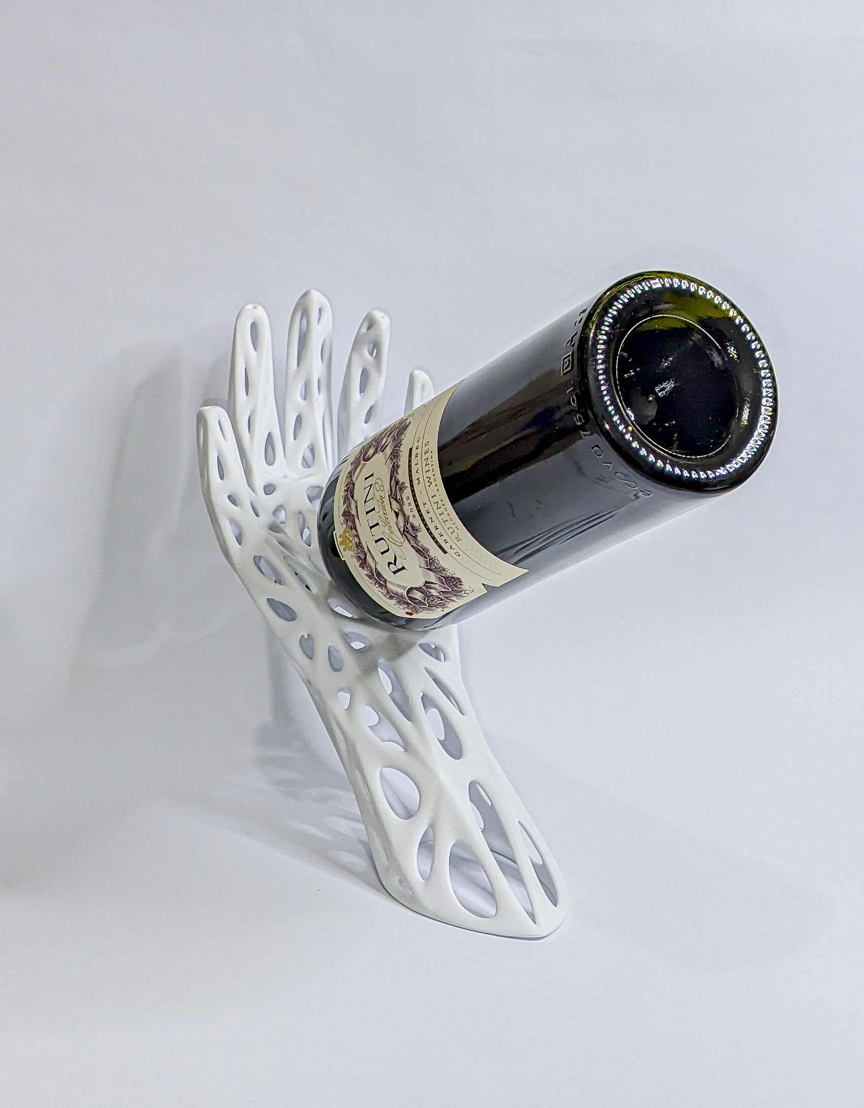 Soporte de vino en forma de mano